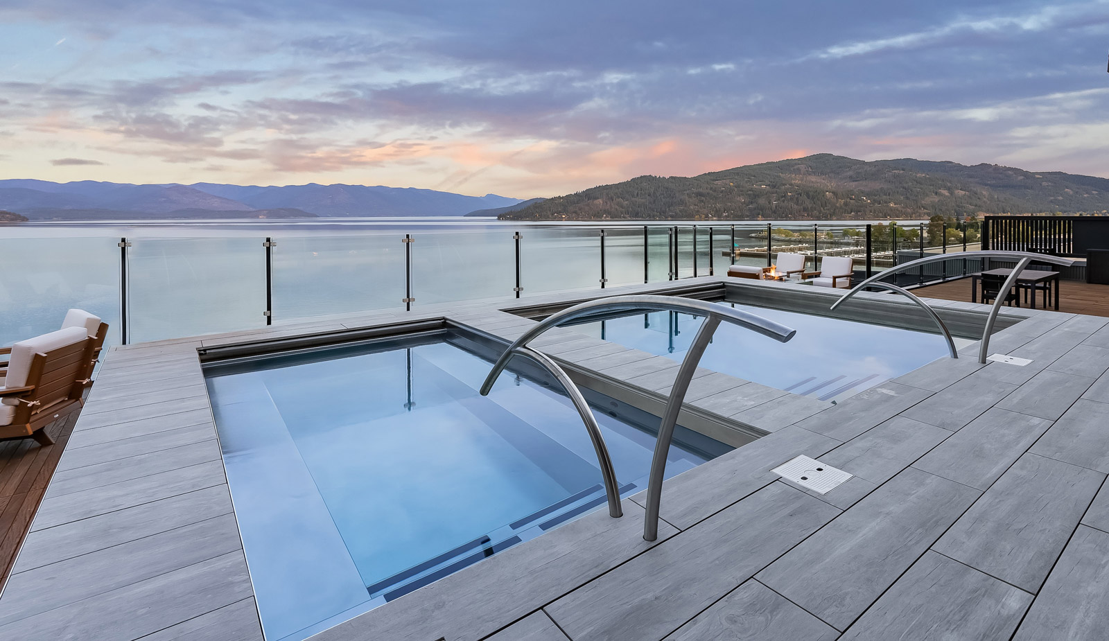 Rooftop stainless steel pool and spa with automatic cover and LED lighting.  Both pool and spa have interior descending stairways and bench seating.  179”x330”x48”